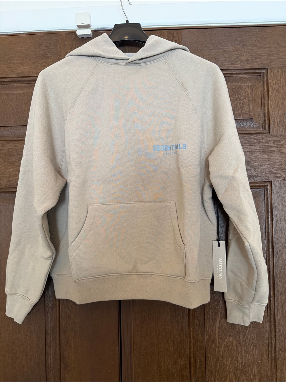 Fear of God Essentials Hoodie in tan, XS, new